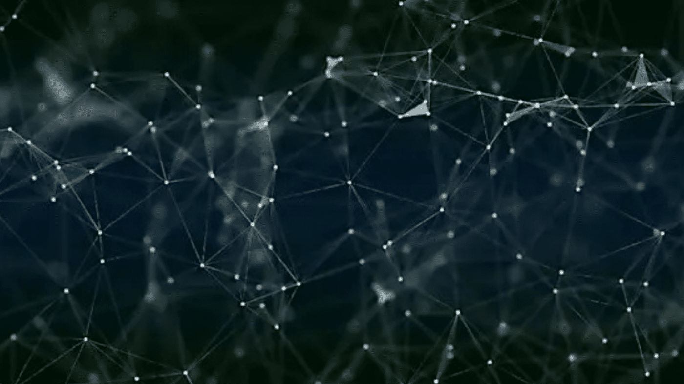 Abstract network of interconnected white dots and lines on a dark, blurred background, creating a digital, web-like pattern that suggests data connections or a complex technological structure.